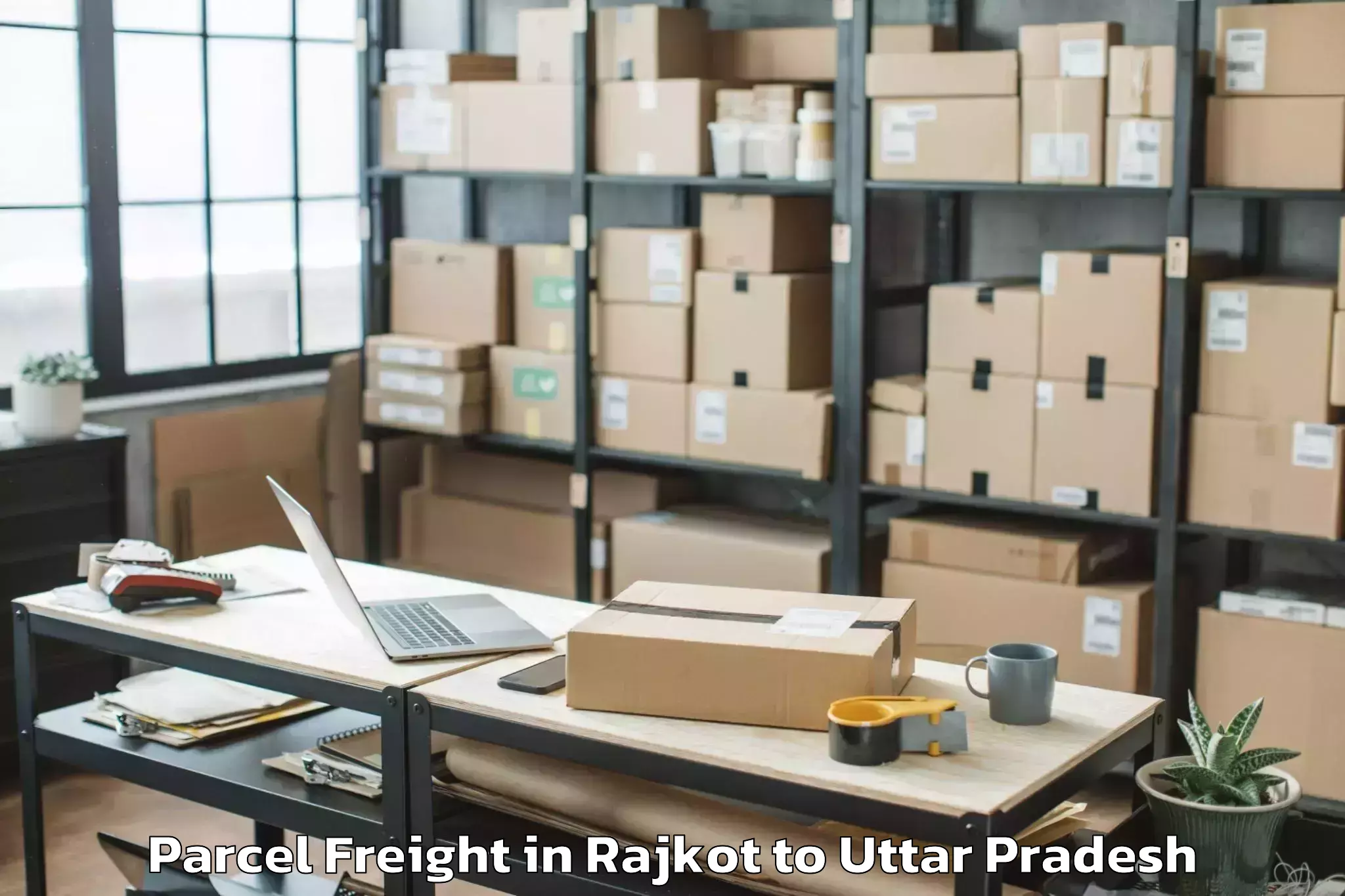 Easy Rajkot to Gahmar Parcel Freight Booking